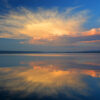 Cloud Shelf Reflects Over Yellowstone Lake At Sunset In Yellowstone National Park, Wyoming