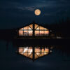 Full Moon Rises Over The Grant Village Lake House In Yellowstone National Park, Wyoming
