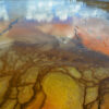 Bright Colors Through The Bacterial Mats In Midway Geyser Basin Of Yellowstone National Park, Wyoming