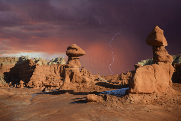 Thunderstorm And A Lightning Strike Over The Goblins In Goblin Valley State Park, Utah