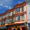 The Savoy Tivoli With Strings Of Lights Over Grant Avenue From Colorful Terraced Houses In San Francisco, California